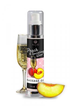 Huile de massage érotique au parfum Vin pétillant à la pêche et enrichie en extrait de truffe.