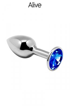 Plug anal en métal dune longueur de 8 cm et un diamètre de 4 cm décoré d'un strass bleu.