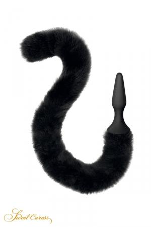 Plug anal noir 100% silicone, prolongé d'une queue articulée en fourrure synthétique noire.