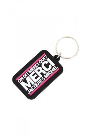 Porte-clés Jacquie & Michel, format rectangulaire, et son slogan incontournable