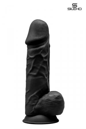 Gode réaliste noir de 21,5 cm et 4,8 cm de diamètre à double densité et mémoire de forme utilisant du silexpan pour des sensation plus réelles.