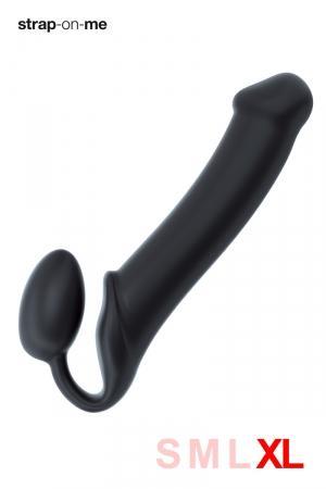 Superbe gode-ceinture flexible de la marque Strap-On-Me, il est noir et mesure 4,5 cm de diamètre.